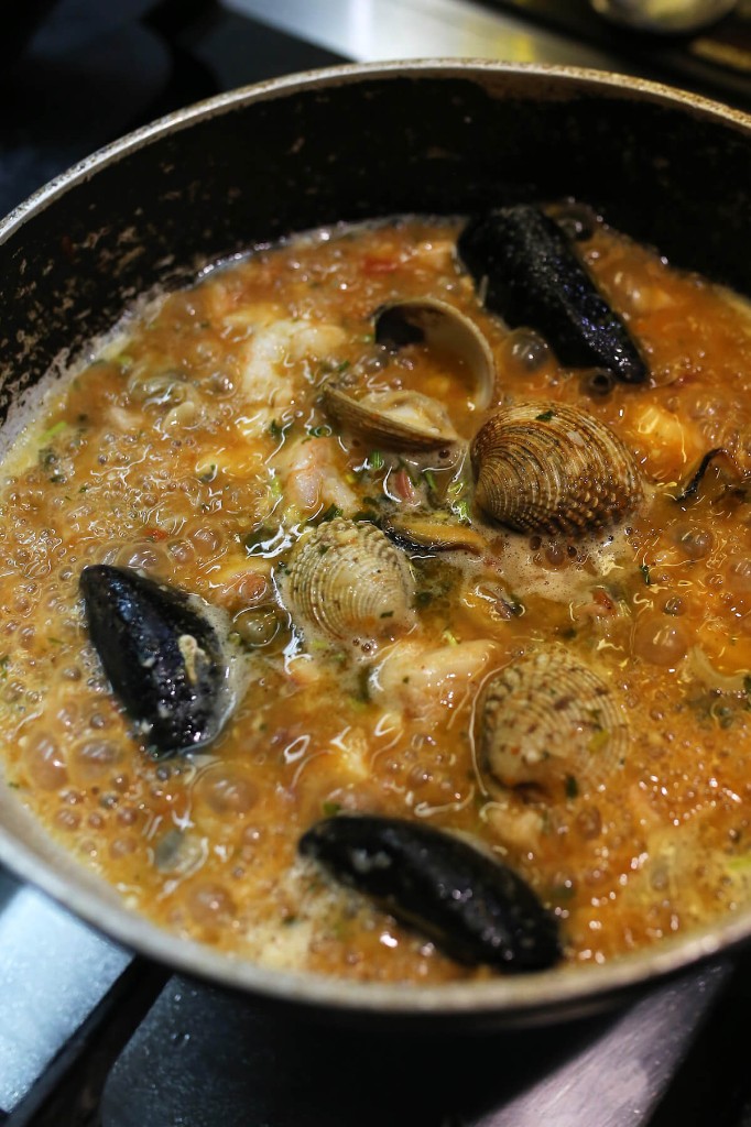 Seafood stew in pan